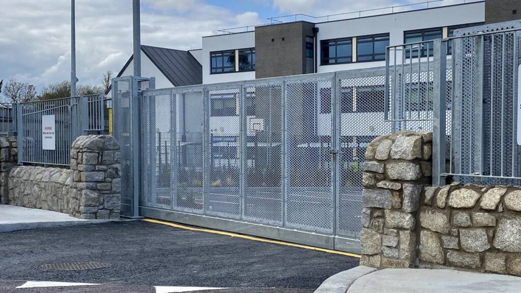 TRACK SLIDING GATE WITH PERFORATED PLATE INFILL 01