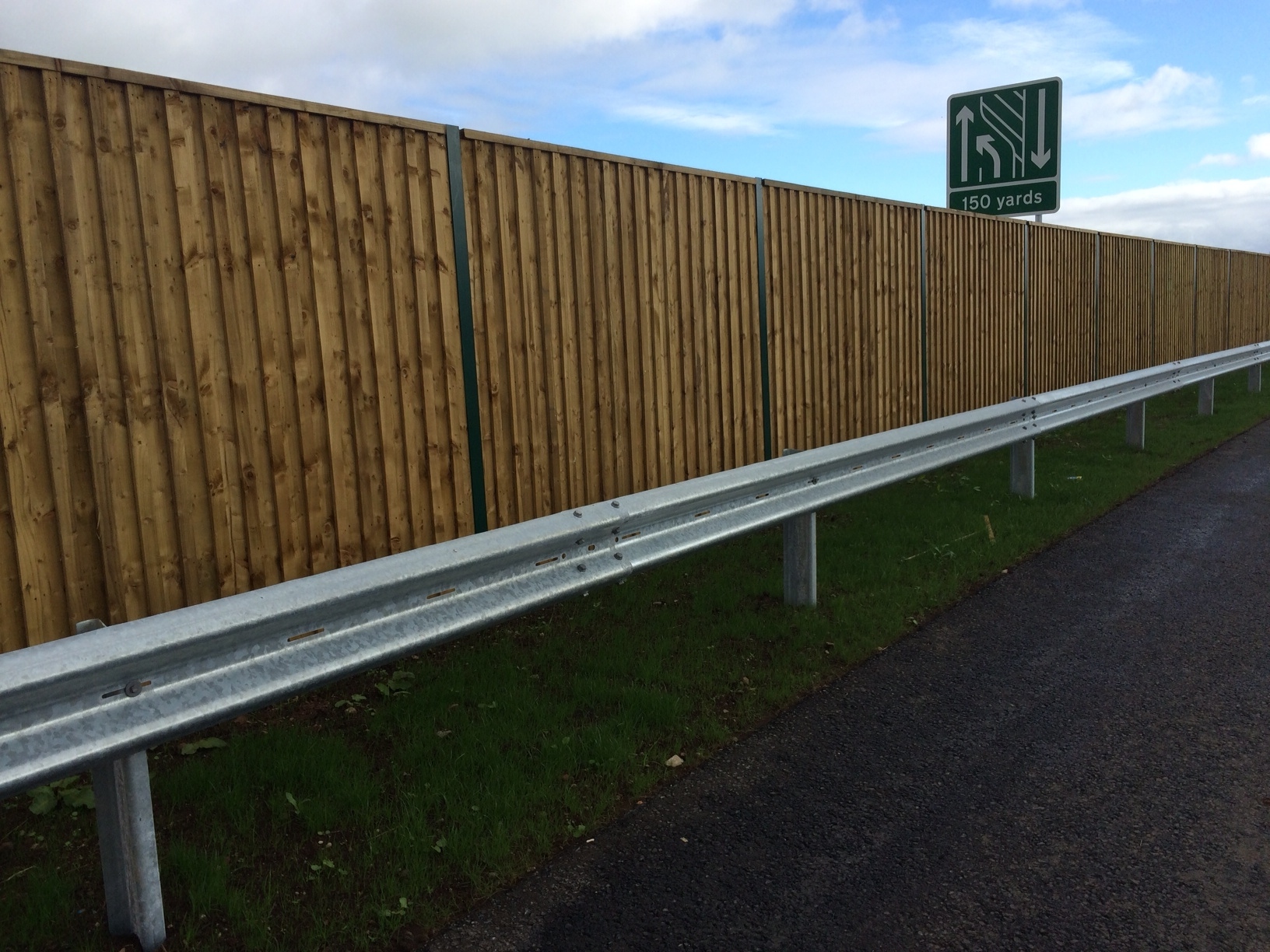 Acoustic reflective barrier